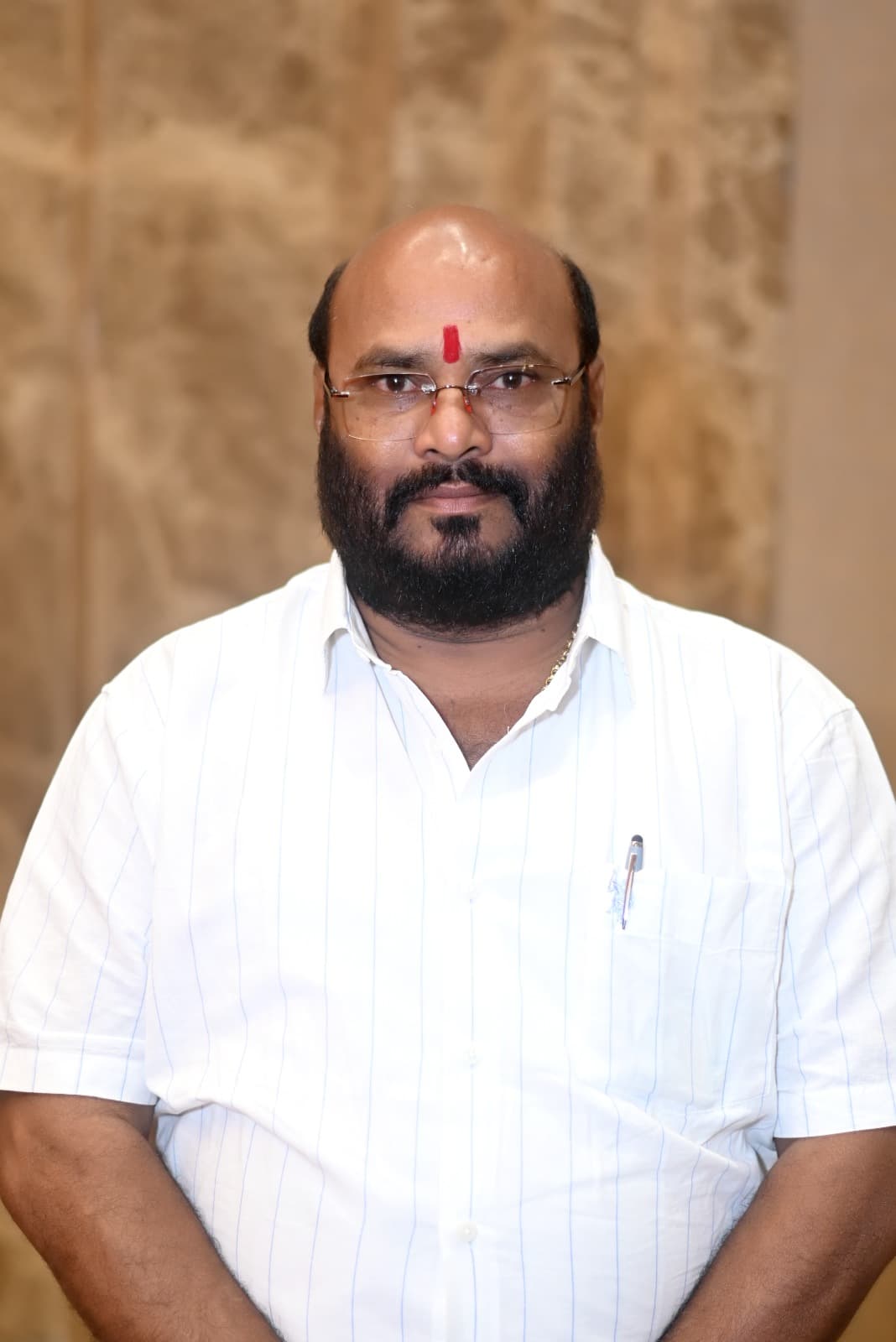 Mr. Kishor S. Changole